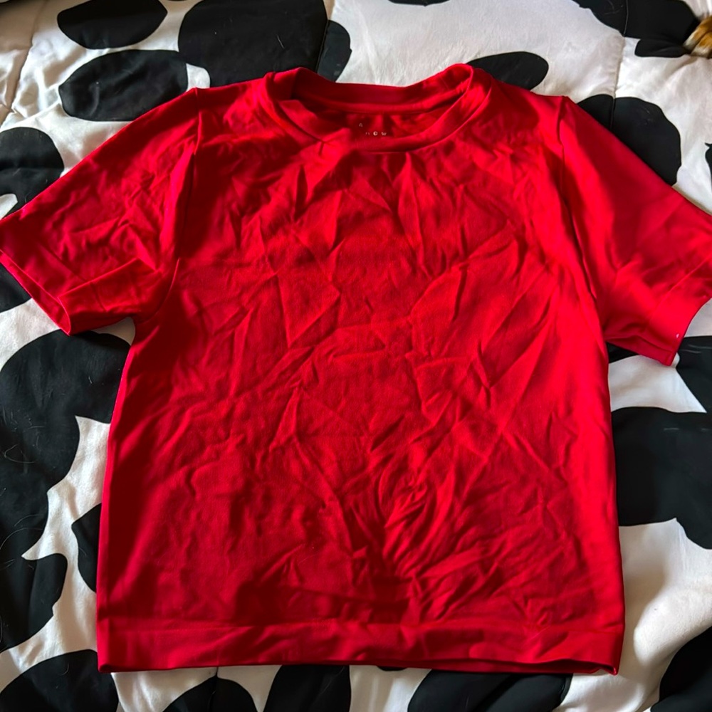 Red skin tight shirt (a little wrinkly- i’m going through an old bag of clothes)